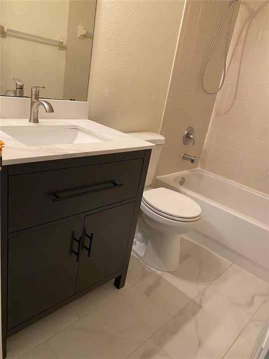 New Hall Bathroom Vanity and Tile floor