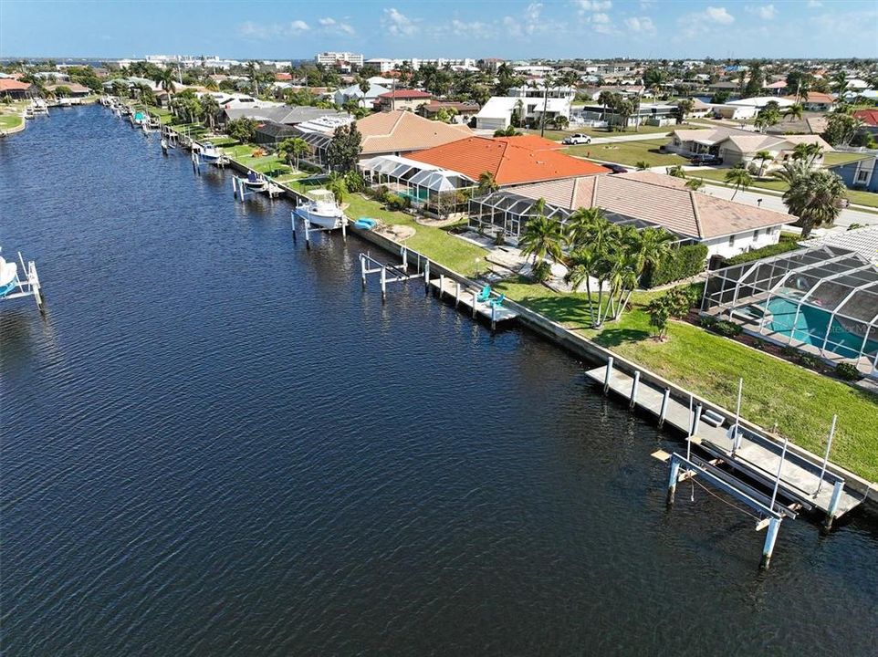 10,000-lb boat lift and 30-ft. dock with Charlotte Harbor in backgroun