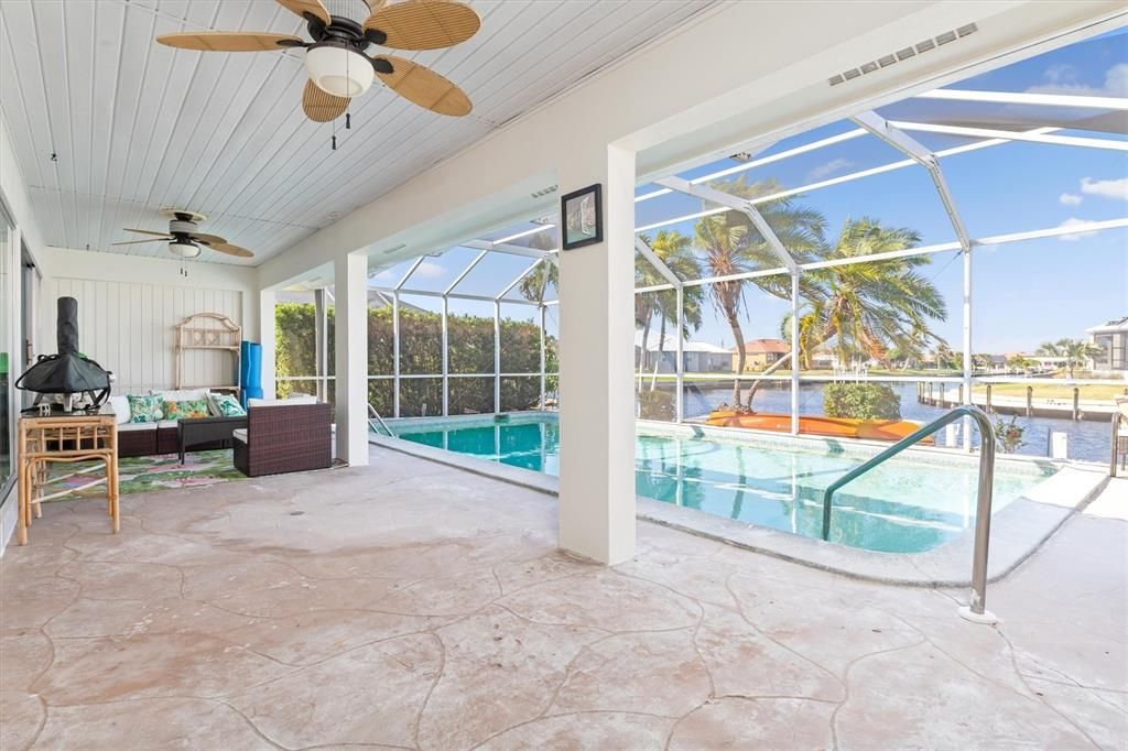 Tons of room within the covered lanai and screened pool cage!
