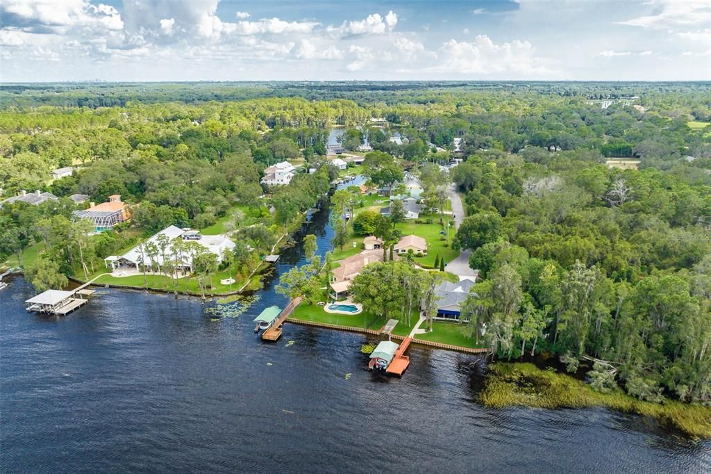 Pristine, Lake Keystone! House is furthest to the right next to wooded area, Beautiful Dock and Boathouse!