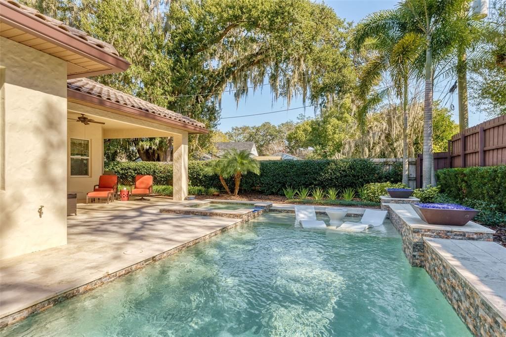 Private yard with tropical landscaping