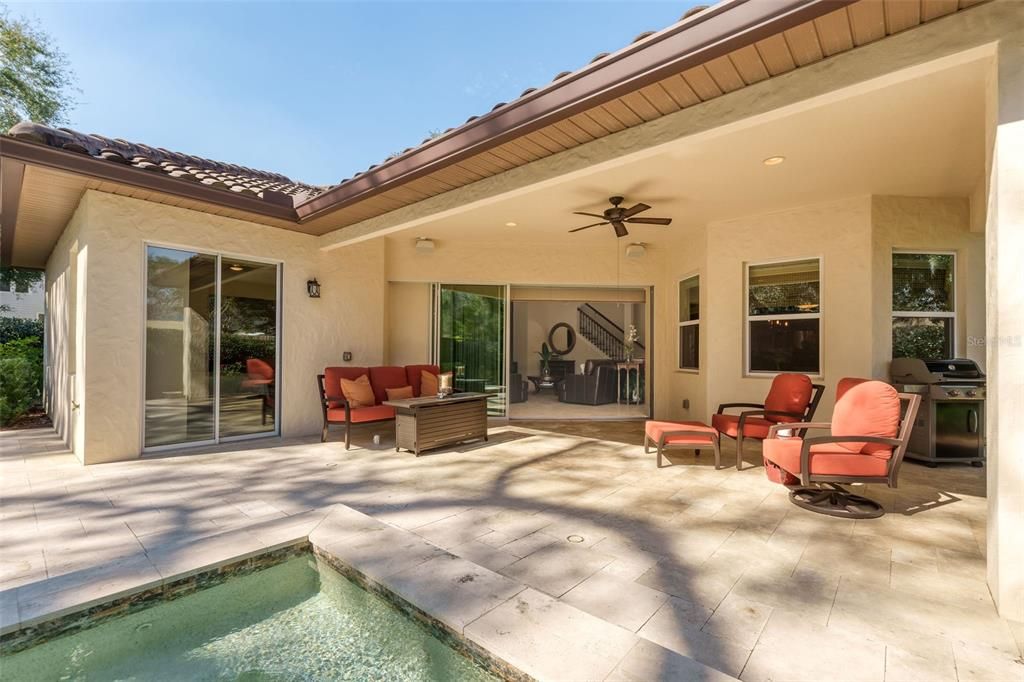 Covered patio with space for lots of seating and stubbed for a gas grill