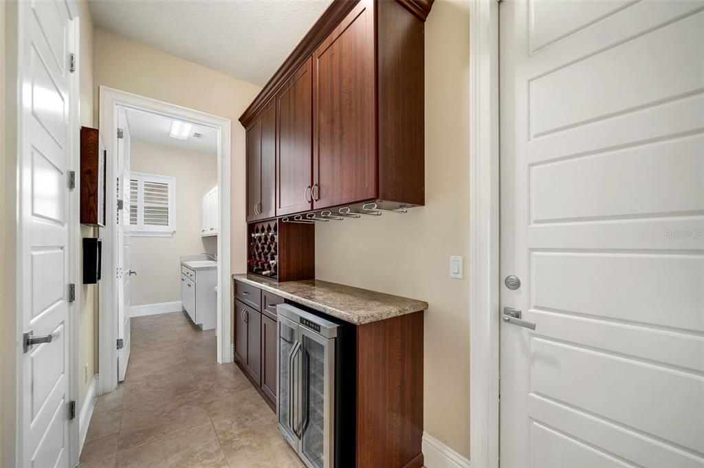 Mudroom with built in cabinetry and closet