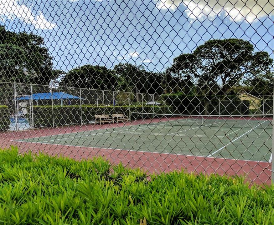 Tennis court & swimming area on far left