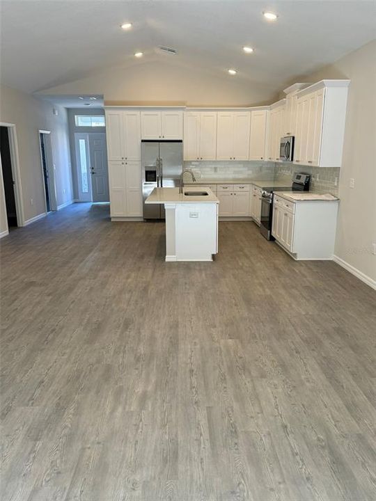 living room into kitchen