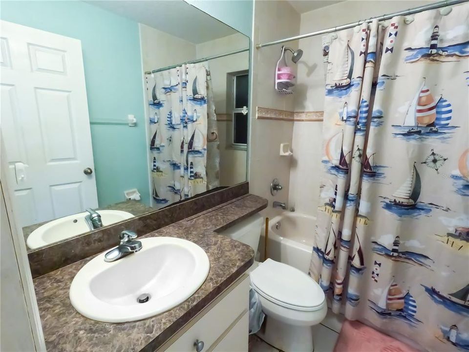 Guest Bath with tub/shower condo