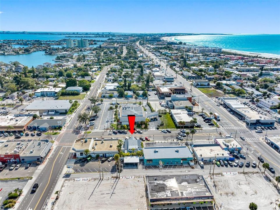 Situated between the Gulf of Mexico and Boca Ciega Bay, it boasts prime storefront space in the Corey Avenue Shopping District.