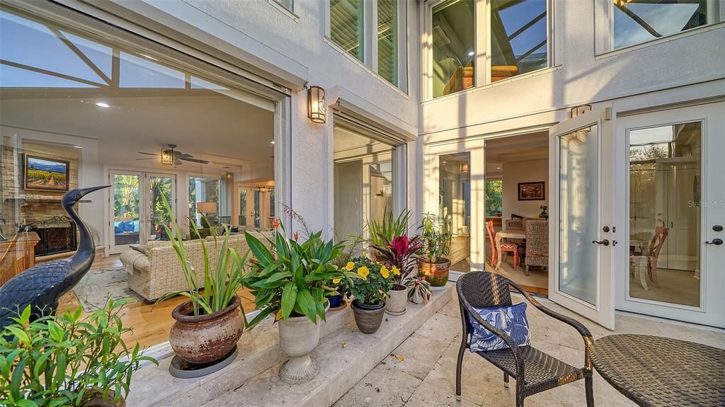 Atrium, private sitting area  with views of family room and dining room