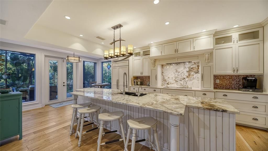 Beautiful kitchen with all wood cabinets, custom granite counters, and top of the line appliances. This is a gourmet kitchen to delight every chef