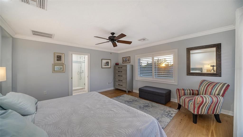 Main upstairs  Master suite with 2 baths.   Plantation shutters and sliding doors to private deck