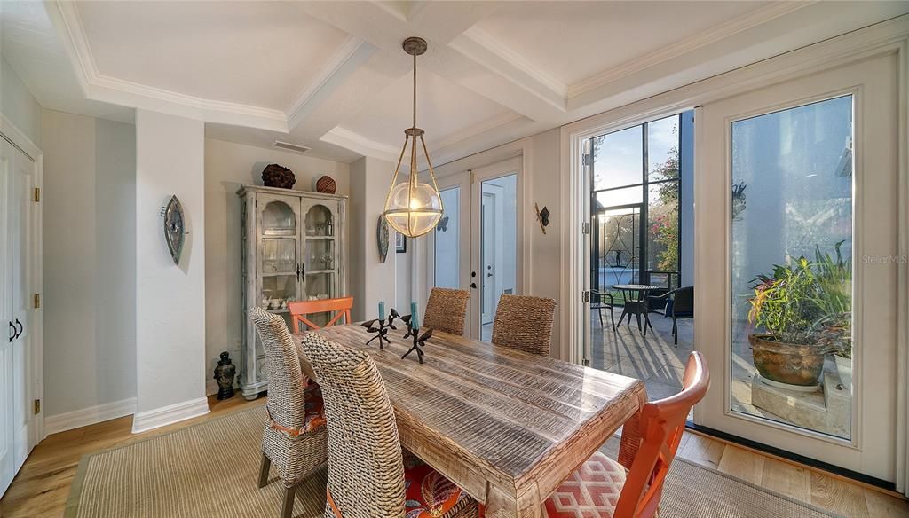 Formal dining overlooking the Atrium with French doors.