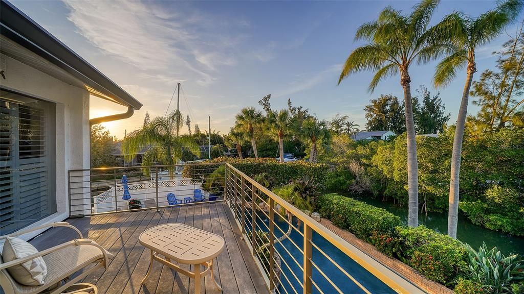 Main suite private deck. Enjoy sunsets and views of canal and pool