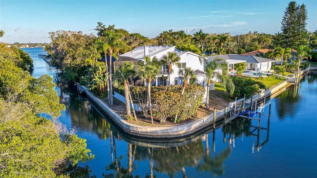 Point location on deep sailboat water with direct access to the Intracoastal. 230 feet of seawall and a large basin for making wide turns    Perfect boaters paradise