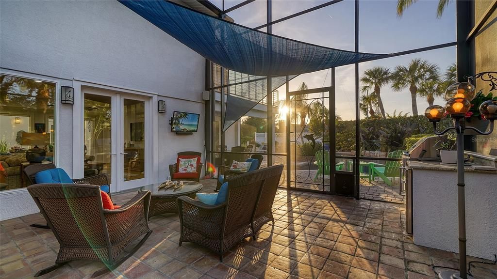 Enjoy sunset from several places outdoors patios with views of pool, sunset and canal