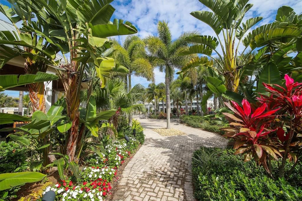 Meticulously landscaped grounds feature the Florida vibe