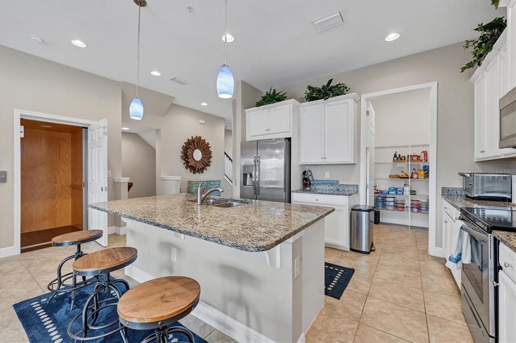 Kitchen features a generous size pantry & a private elevator with access to all floors