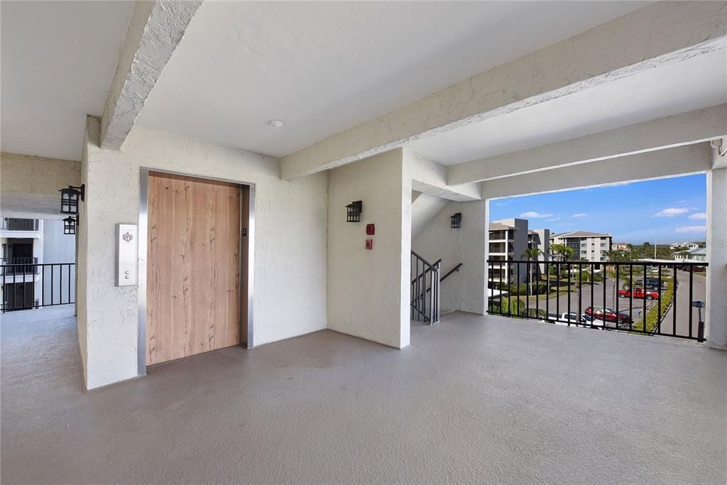 elevators and stairs outside the unit