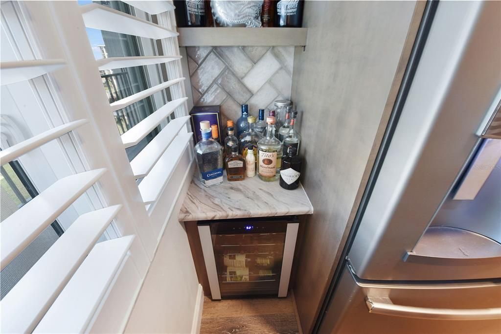 built in mini wine cooler in kitchen nook