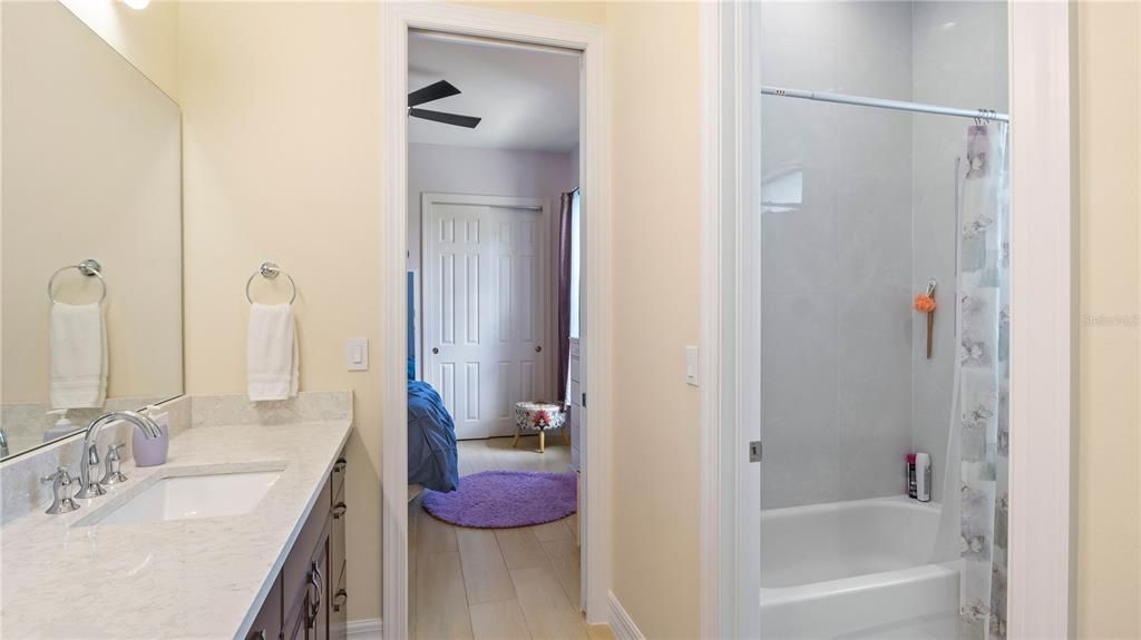 Bathroom - Jack and Jill bath is shared between the two guest bedrooms with a water closet for privacy. There is also an additional half bath for guest to use off the foyer area! Perfect set up for two children as well!