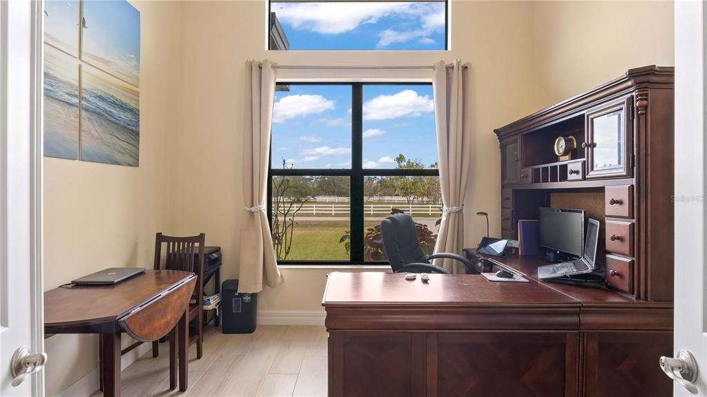Office - Large office space with STUNNING views outside! Double door entry off the great room and can also be a flex room for homeschool, piano room etc.
