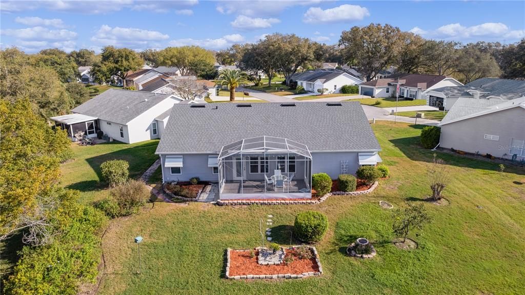 Aerial view of the back of home and the cul-de-sac