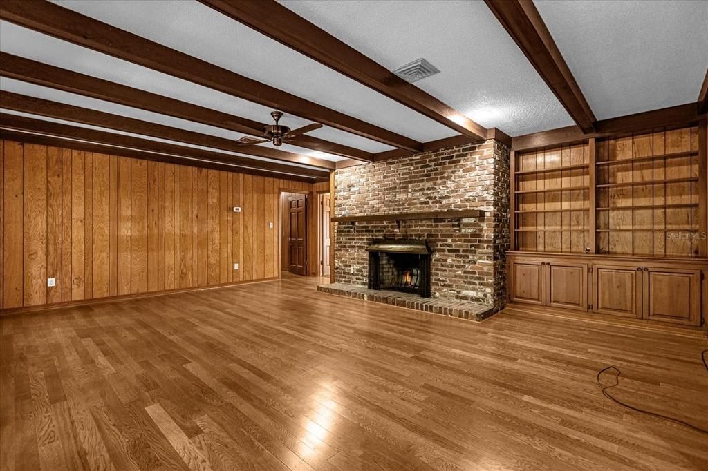 Family Room with Brick Wood Burning Fireplace