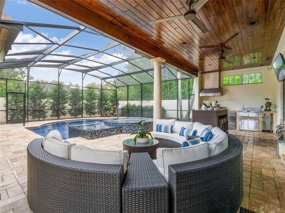 Screened pool/lanai. Featuring outdoor kitchen and full bathroom as well as an outdoor shower.