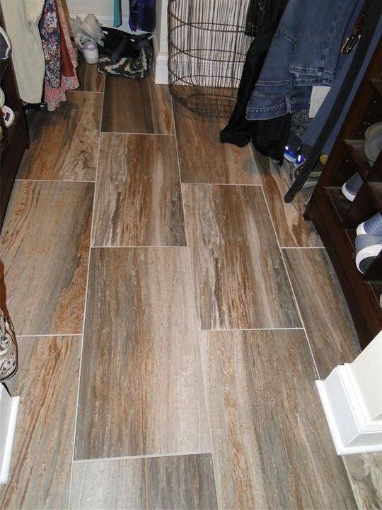 Beautiful Tile throughout Walk-In Closet Area and Bath