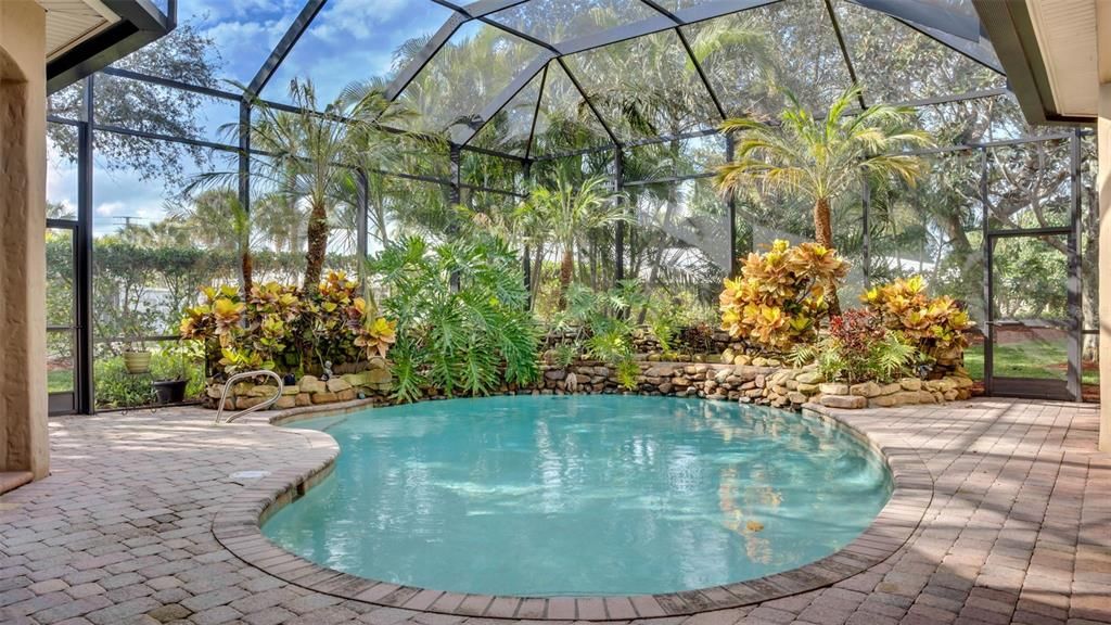 Landscaped pool with water fall feature