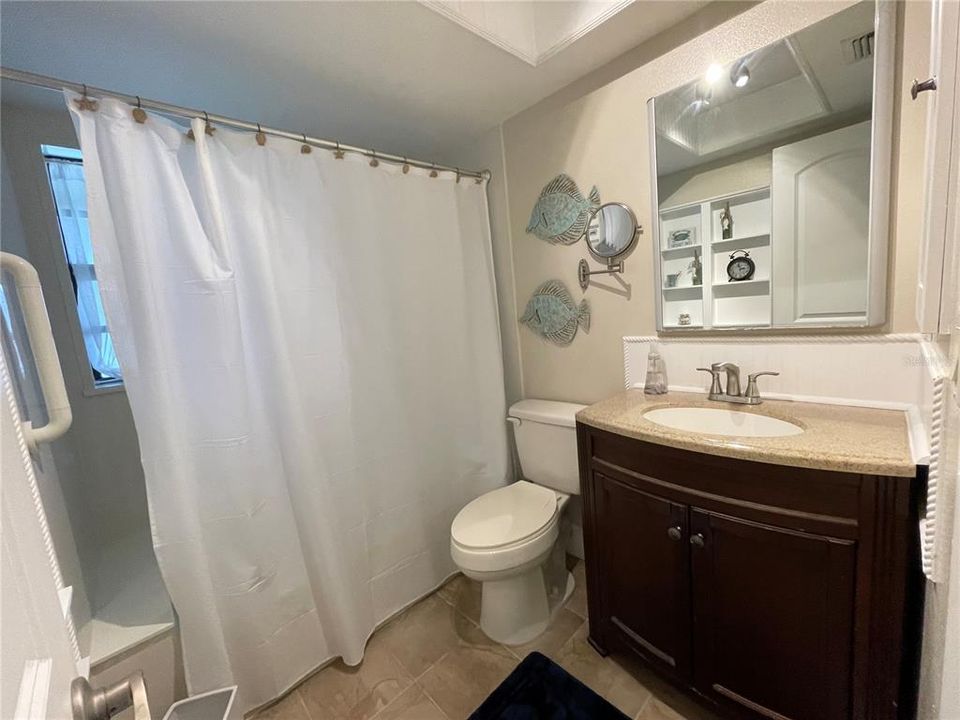 Upstairs full bathroom with shower tub combo