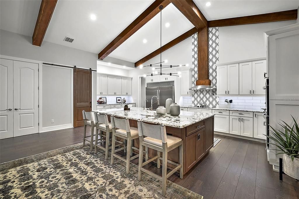 Designer tile steals the show in this stunning kitchen.