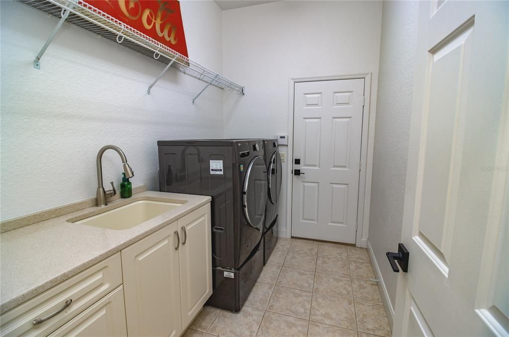 Laundry room with exit to 3 car garage