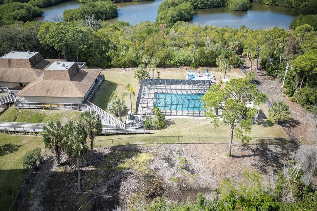 Birdseye view of the pool and clubhouse from the east