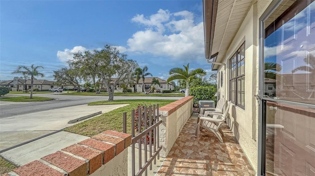 This front porch received an upgrade with the installation of outdoor tile flooring.