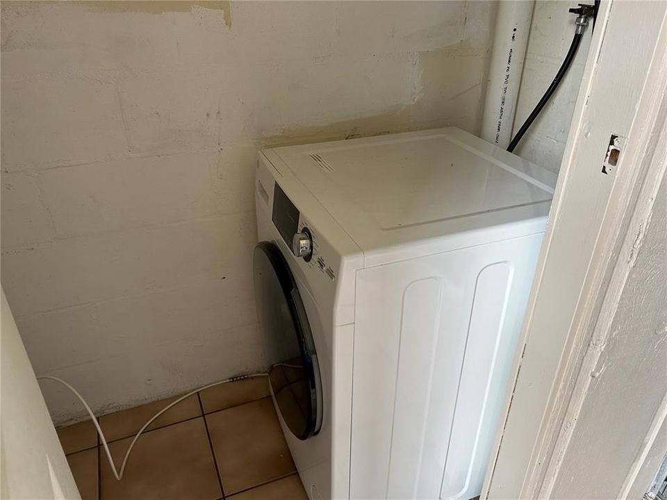 Washer and Dryer combination off of patio
