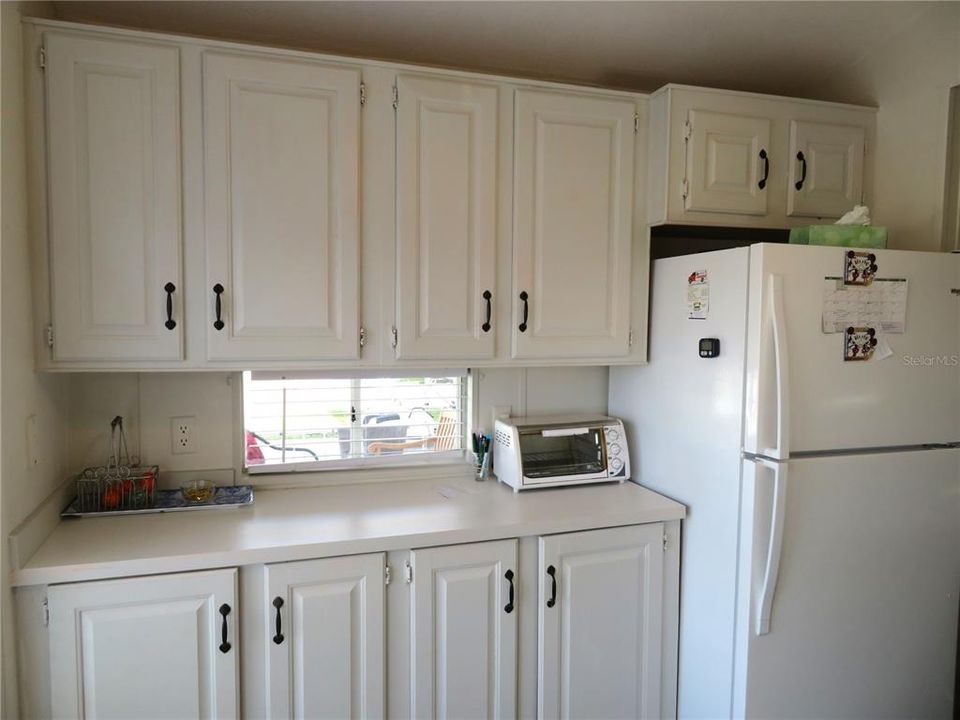 Kitchen overlooks front of the property and benefits from lots of cabinet space