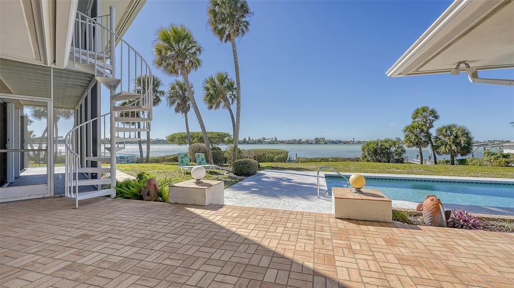 Watch the sunsets and the boats go by from the large outdoor entertaining space.