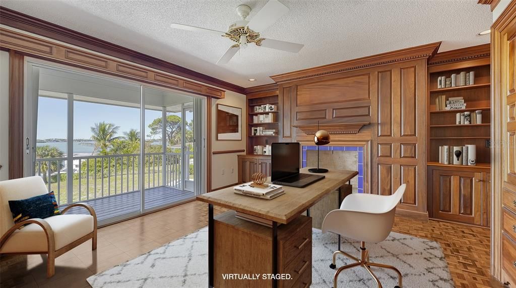 Stunning office with access to a screened balcony overlooking the intracoastal waterway.  Virtually staged.