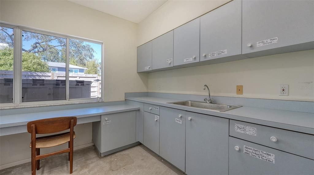 This is one of two air conditioned rooms that are attached to the main house via a covered walkway. This room is north facing and was used as an art studio.