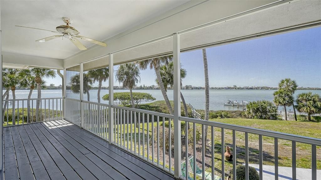 Take a break from work and watch the boats go by on the second floor screened balcony.