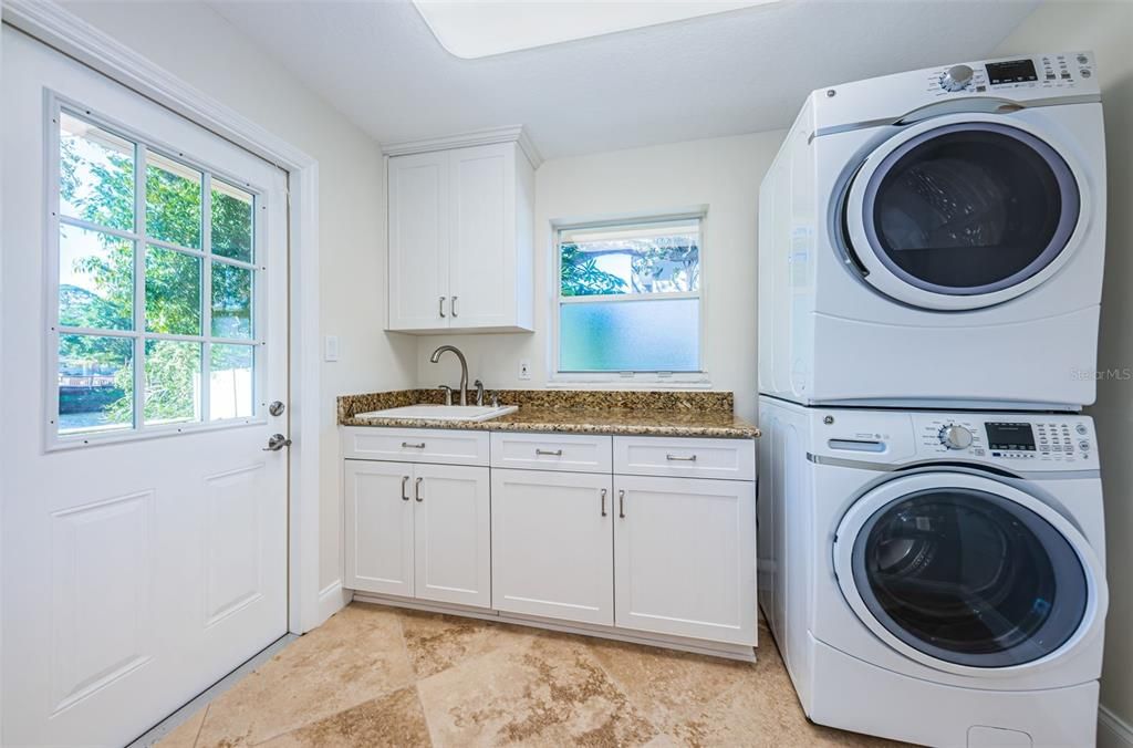 White kitchen w/ granite and tile backsplash!