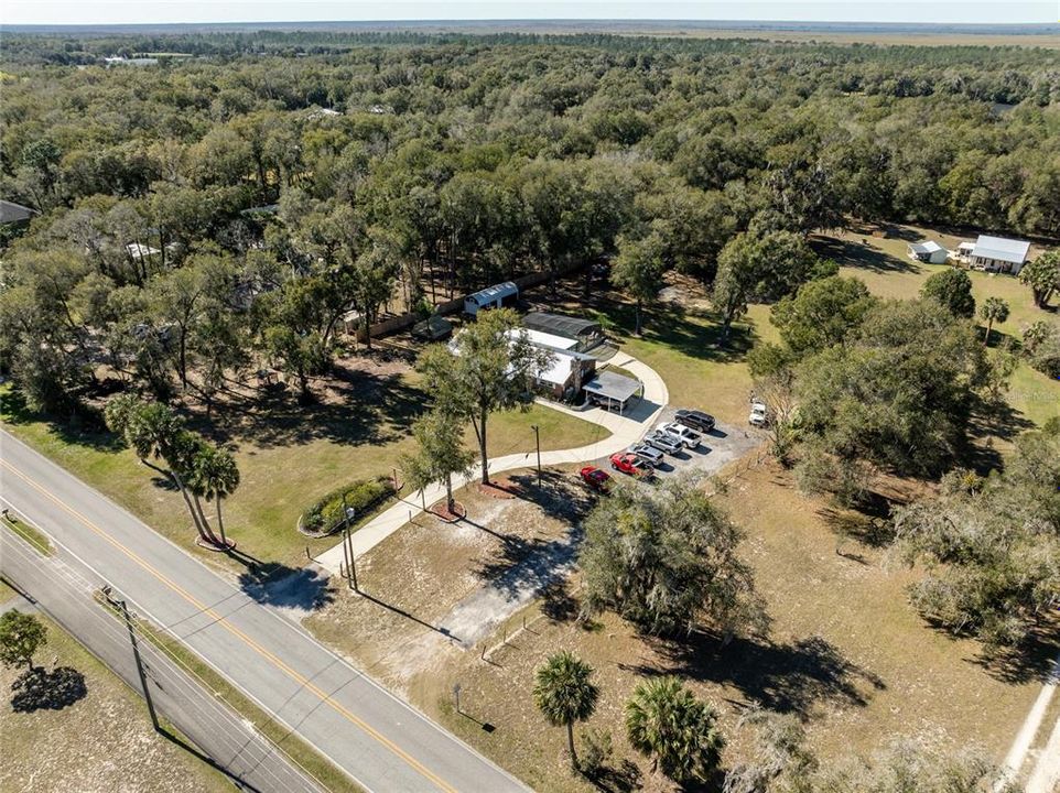 Aerial View shows Long Driveway and Plenty of Parking on 1.59 Acres