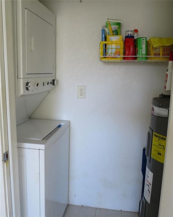 Utility room with stackable washer and dryer