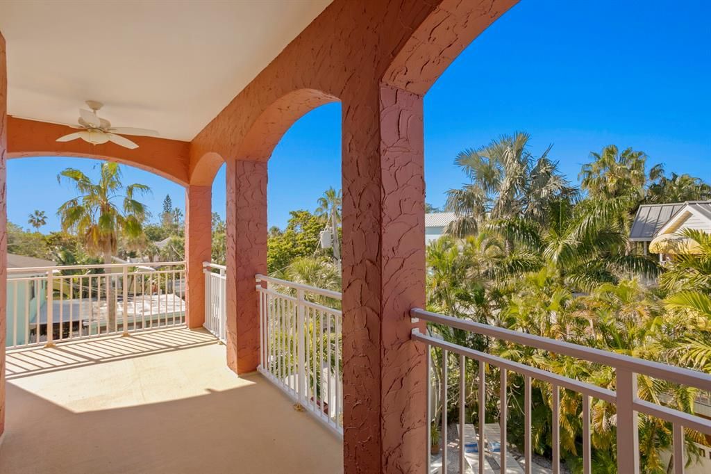 Primary Suite balcony overlooking heated pool