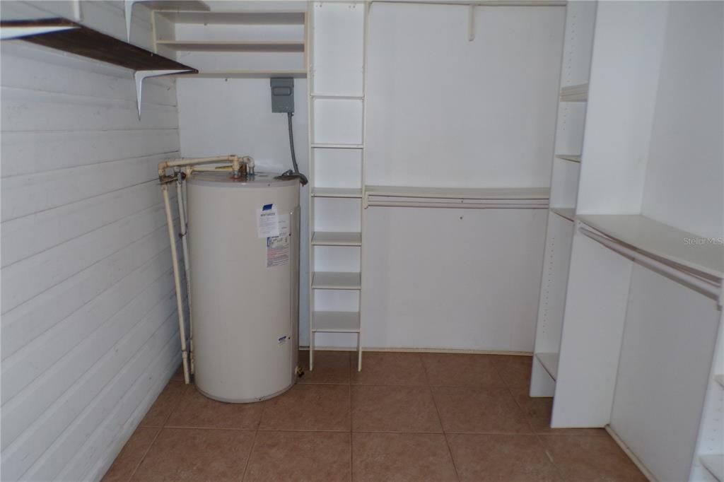 Primary walk in closet with washer/dryer hookups