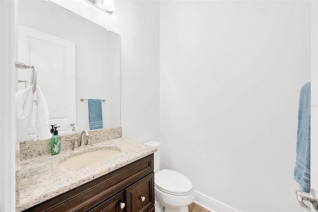 Half Bath located by Laundry Room and Office