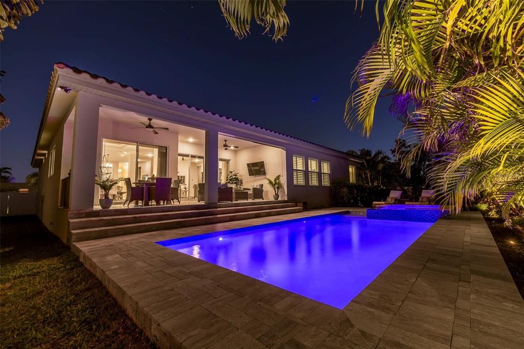 Expansive pool deck and separately heated pool and spa features Pentair remote access from your smartphone.
