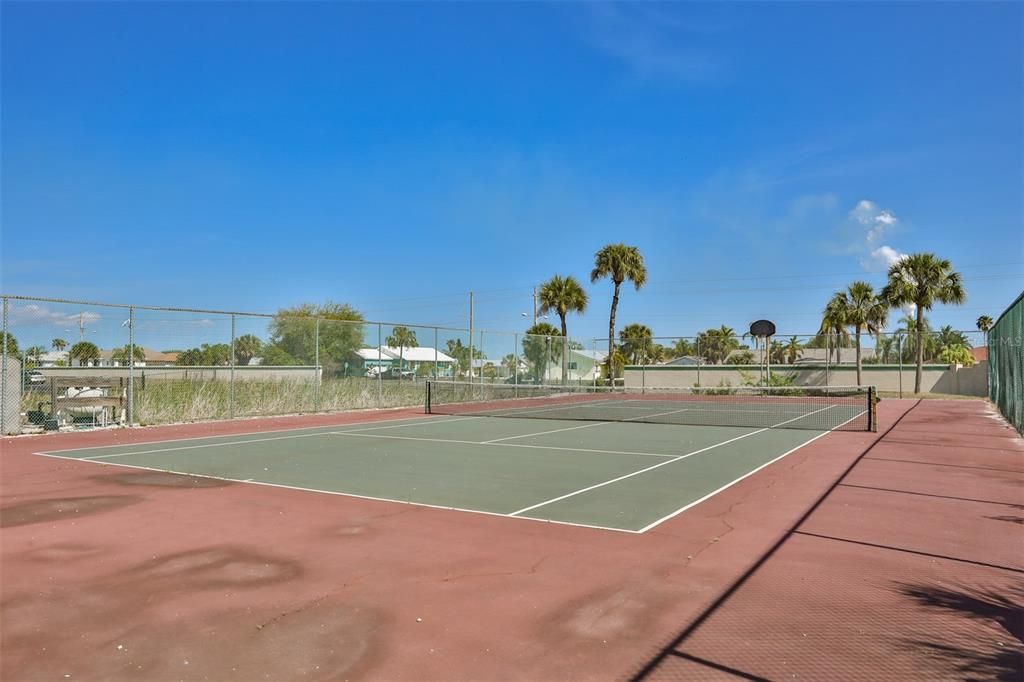 Play a round of tennis with friends and neighbors or use the basketball hoop.