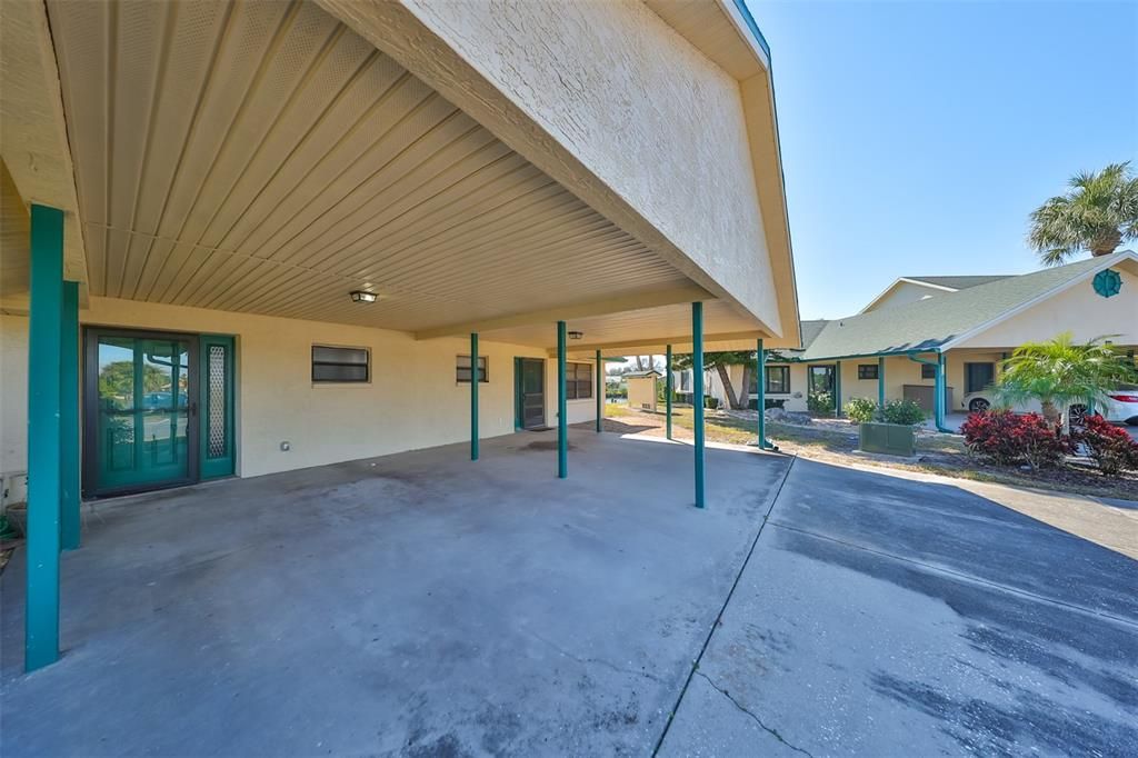 Front door of the unit. Corner end unit.