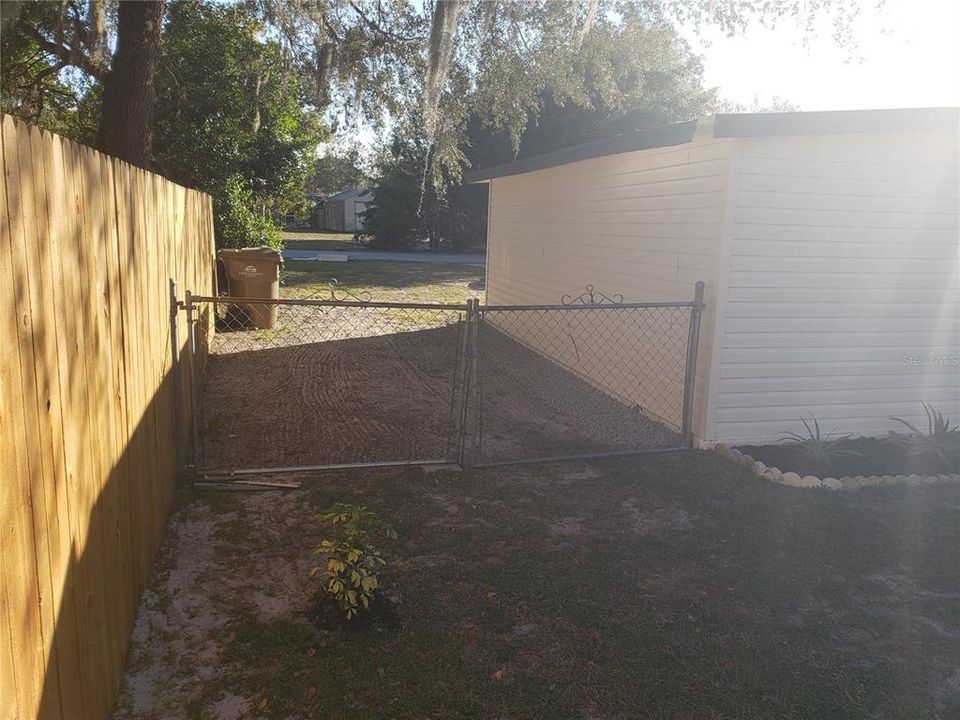 Side yard with drive gate